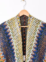 【2色展開】Elcamino エスニックデザイン タッセル付き ケープ