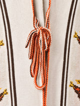 フリンジニットポンチョ