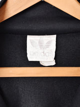 adidasトレフォイルロゴ刺繍ジョギングトップ